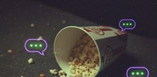 Top 5 Teasers That Hyped Us More Than the Actual Movie Movie theater floor with spilled popcorn, phone, and ticket.