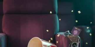 AMC vs Regal: Who Has the Best Movie-Going Experience? Spilled popcorn, broken 3D glasses, and movie theater conflict.