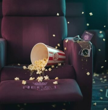 AMC vs Regal: Who Has the Best Movie-Going Experience? Spilled popcorn, broken 3D glasses, and movie theater conflict.
