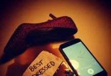 Oscars 2025: Red Carpet Looks Everyone’s Talking About Ruby stiletto, betting slip, and cracked phone in a turmeric orange and violet palette.