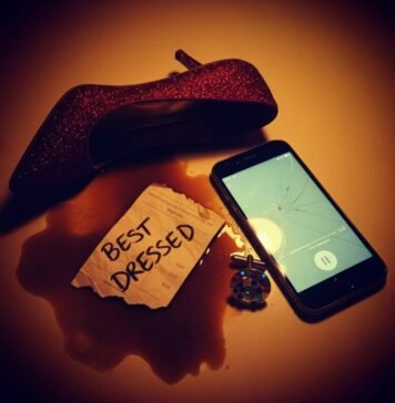 Oscars 2025: Red Carpet Looks Everyone’s Talking About Ruby stiletto, betting slip, and cracked phone in a turmeric orange and violet palette.