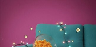 Top 20 TV Shows Everyone’s Talking About in 2025 Couch with Cheetos, iPhone, Christmas lights, and a sock.